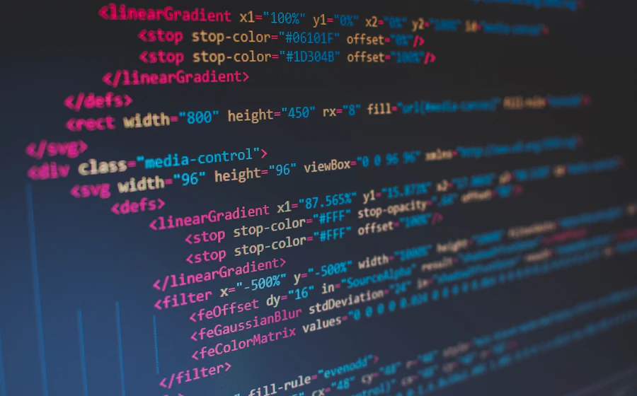A developer building a website on a laptop